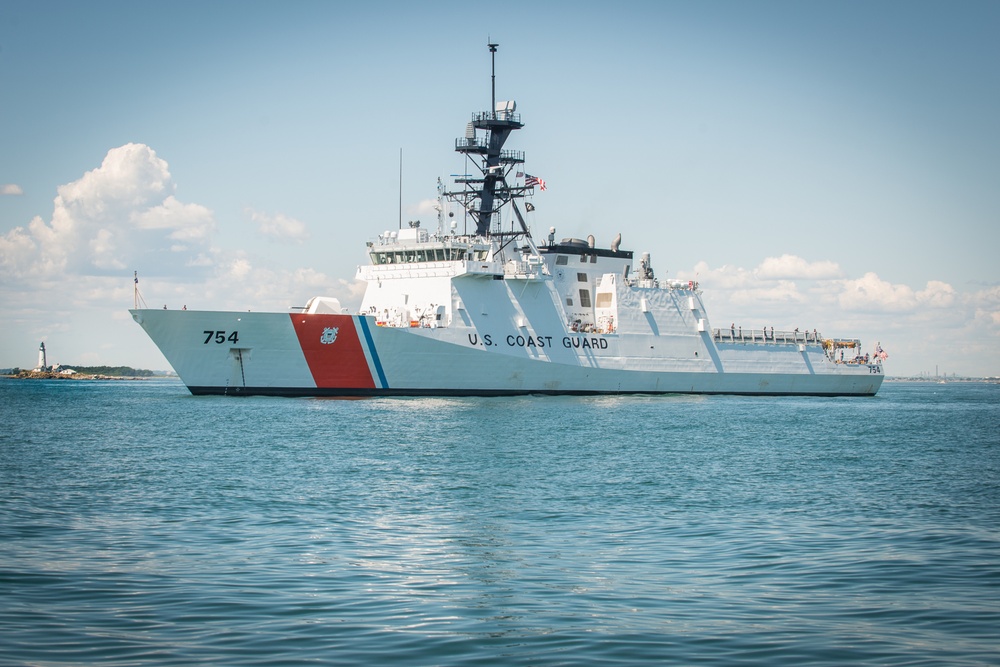 Prior to its commissioning in Boston, US Coast Guard cutter James anchors near Boston Light