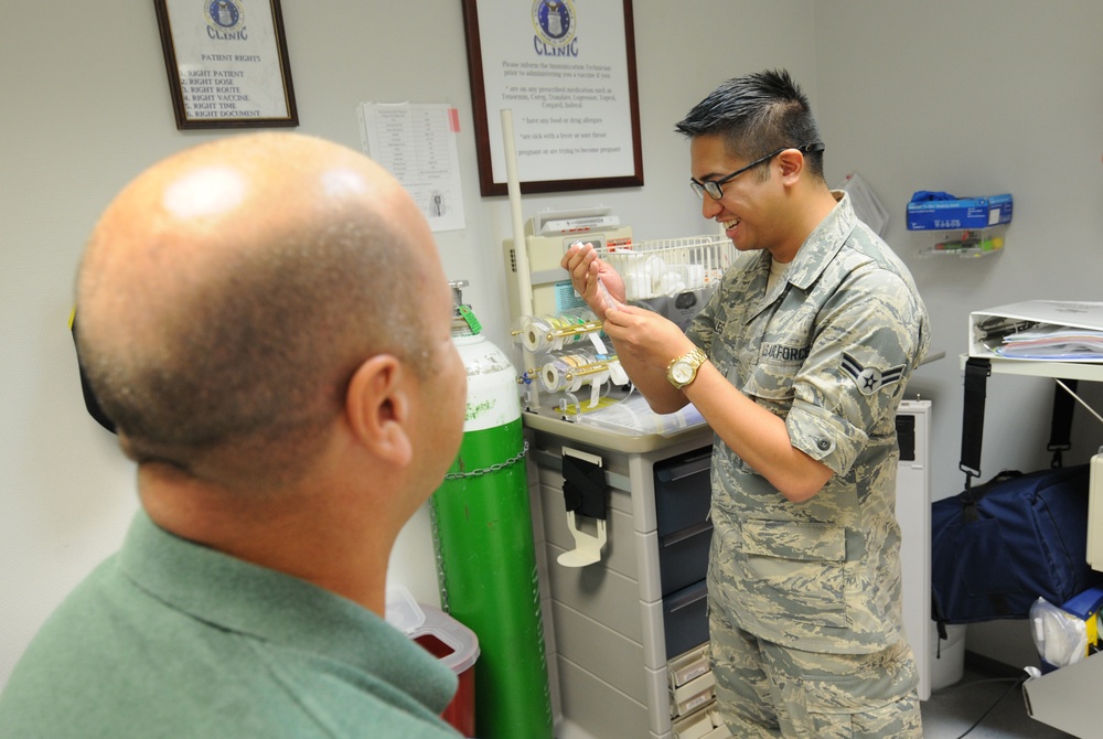 NJ ANG aerospace medical technicians administer immunizations to patients on Ramstein Air Base
