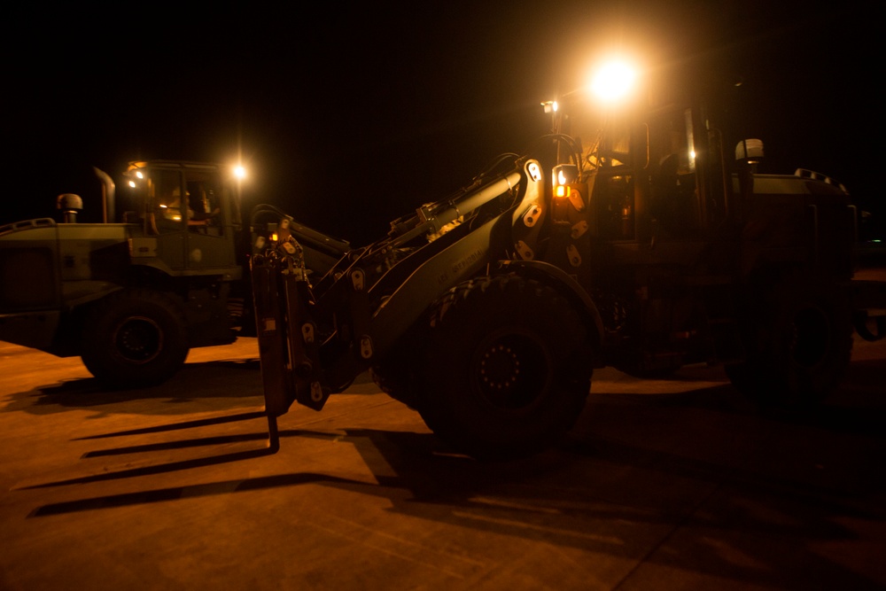 VMAQ-3 loads cargo onto commercial cargo aircraft