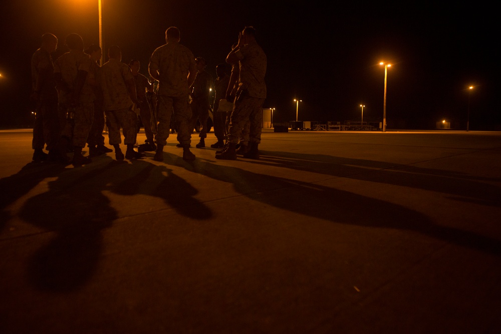 VMAQ-3 loads cargo onto commercial cargo aircraft