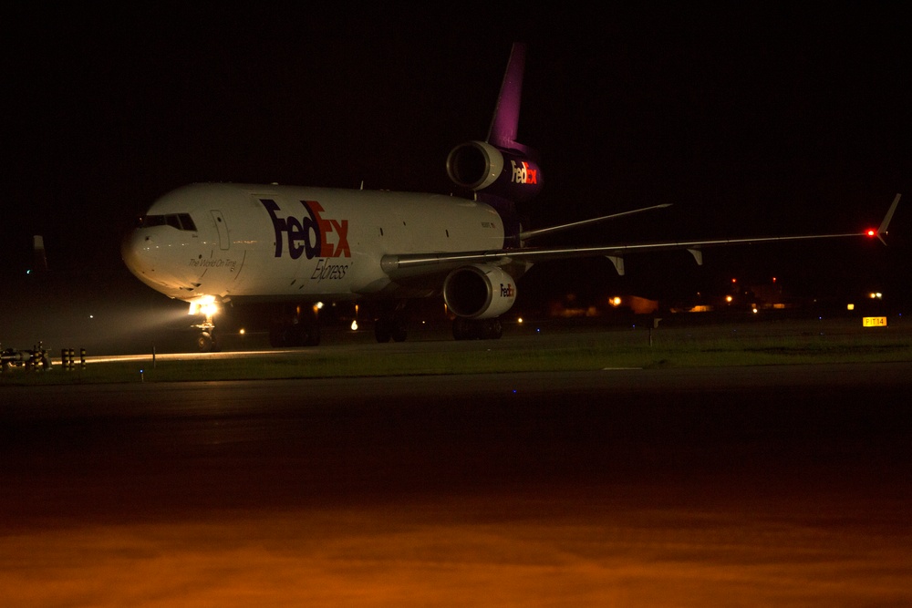 VMAQ-3 loads cargo onto commercial cargo aircraft