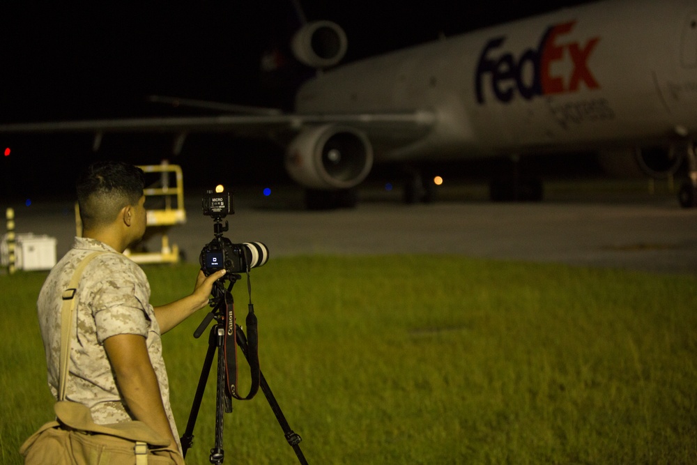 VMAQ-3 loads cargo onto commercial cargo aircraft