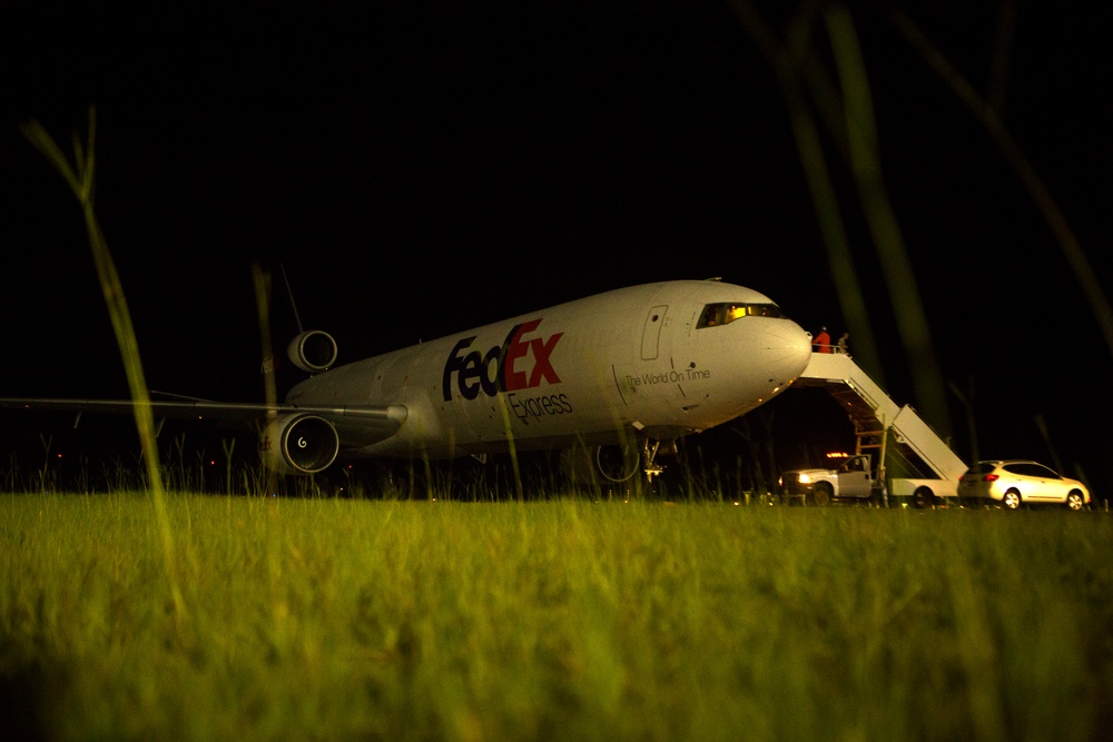 VMAQ-3 loads cargo onto commercial cargo aircraft