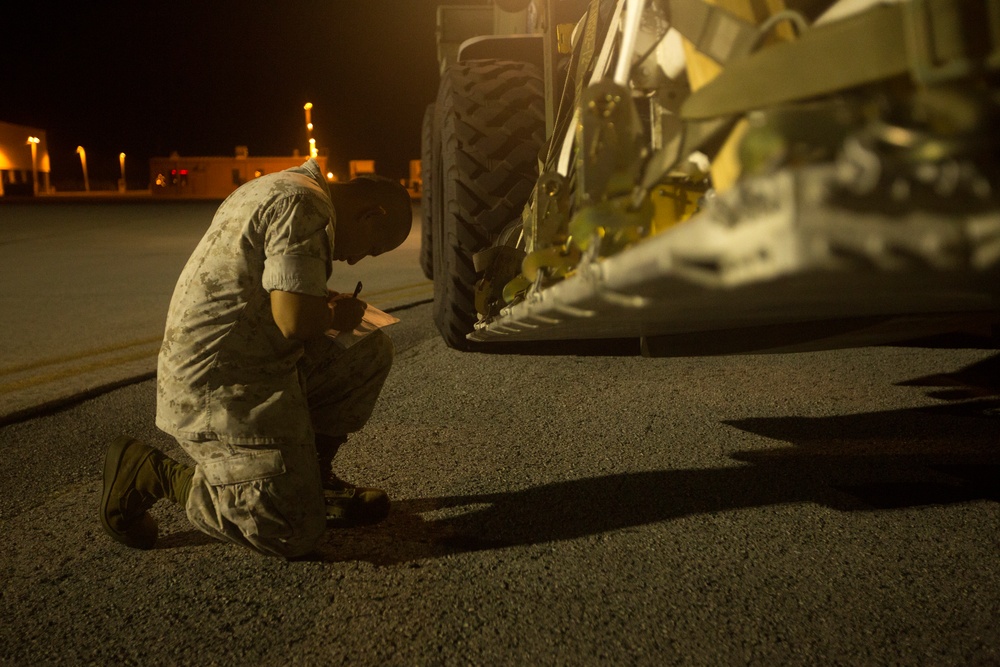 VMAQ-3 loads cargo onto commercial cargo aircraft