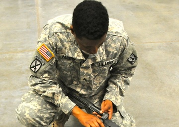 NCO trains cadets on M16