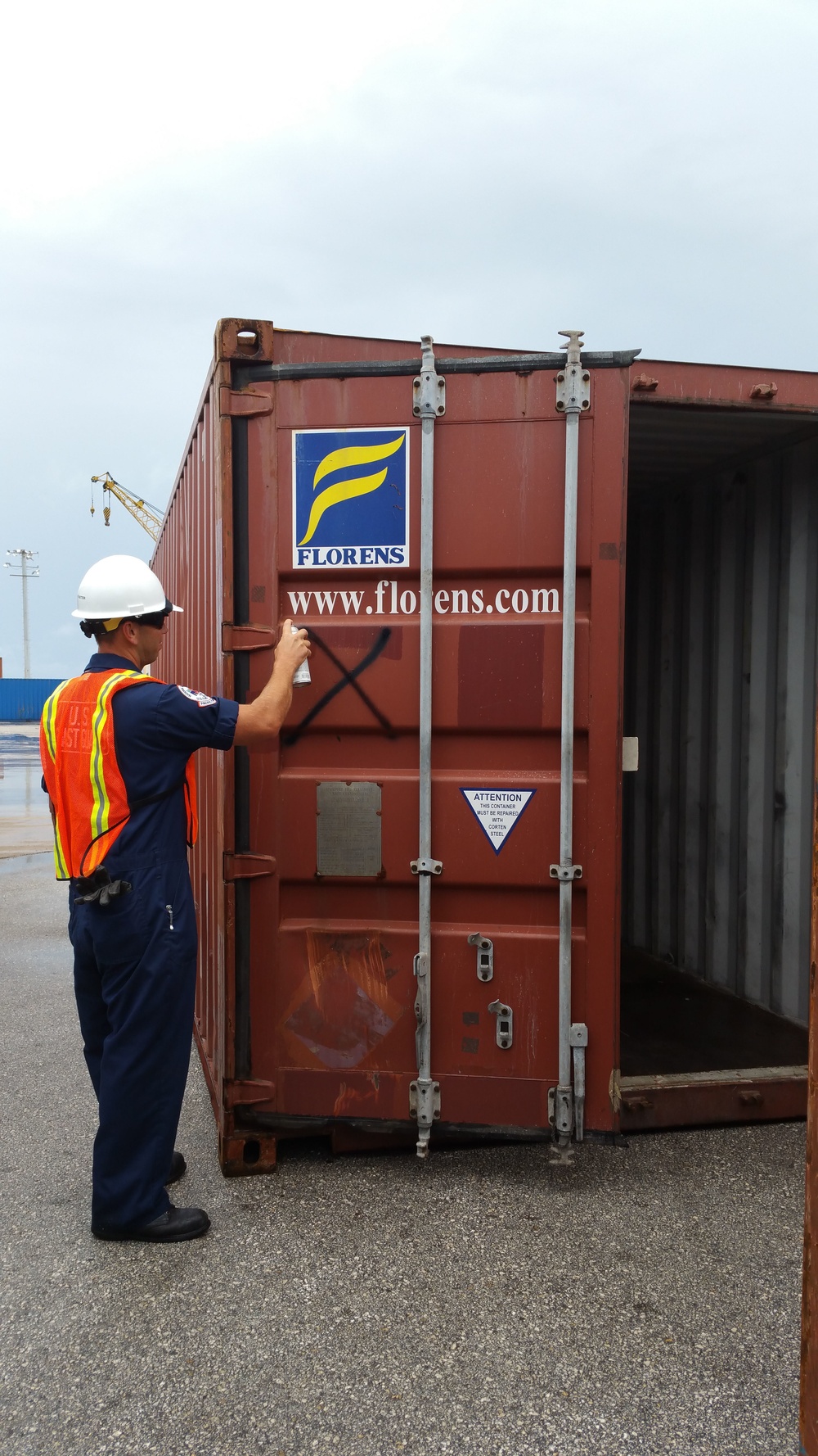 Coast Guard inspects damaged containers after Typhoon Soudelor