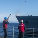 USS Mobile Bay conducts replenishment at sea