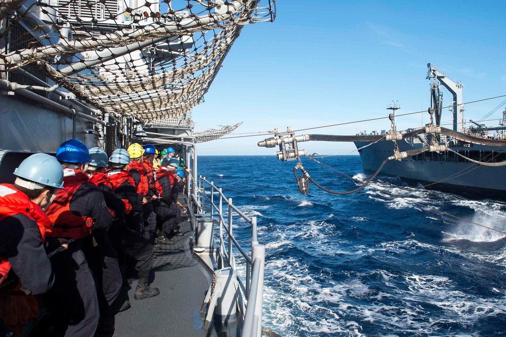 USS Mobile Bay conducts replenishment at sea