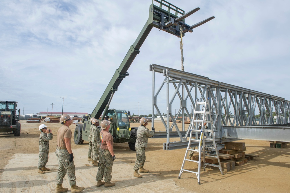 Naval Mobile Construction Battalion 4 trains to erect a Mabey Johnson Bridge