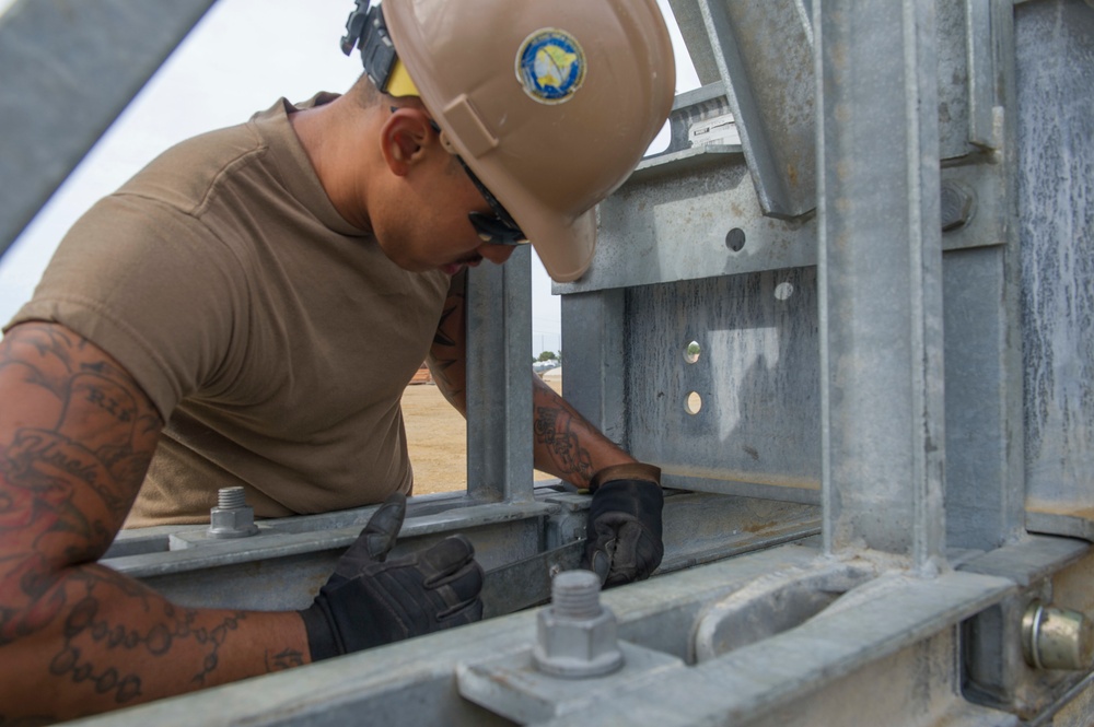 Naval Mobile Construction Battalion 4 trains to erect a Mabey Johnson Bridge