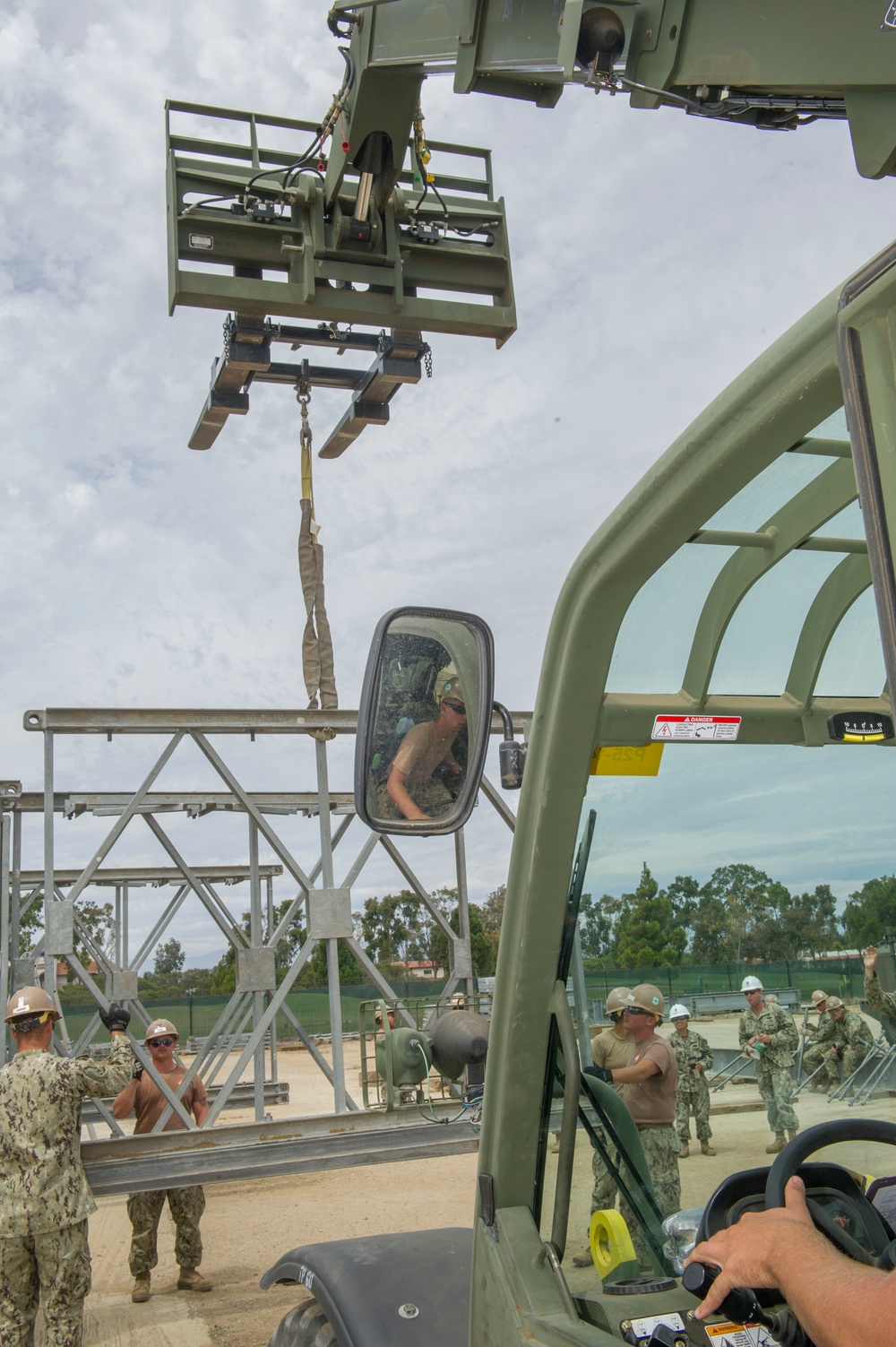 Naval Mobile Construction Battalion 4 trains to erect a Mabey Johnson Bridge