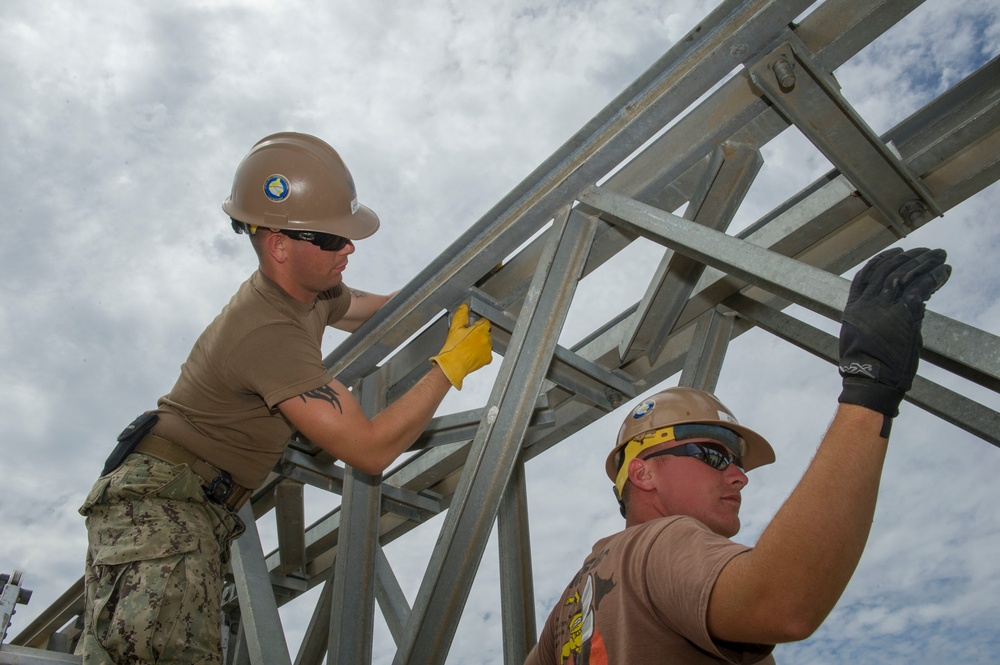 Naval Mobile Construction Battalion 4 trains to erect a Mabey Johnson Bridge