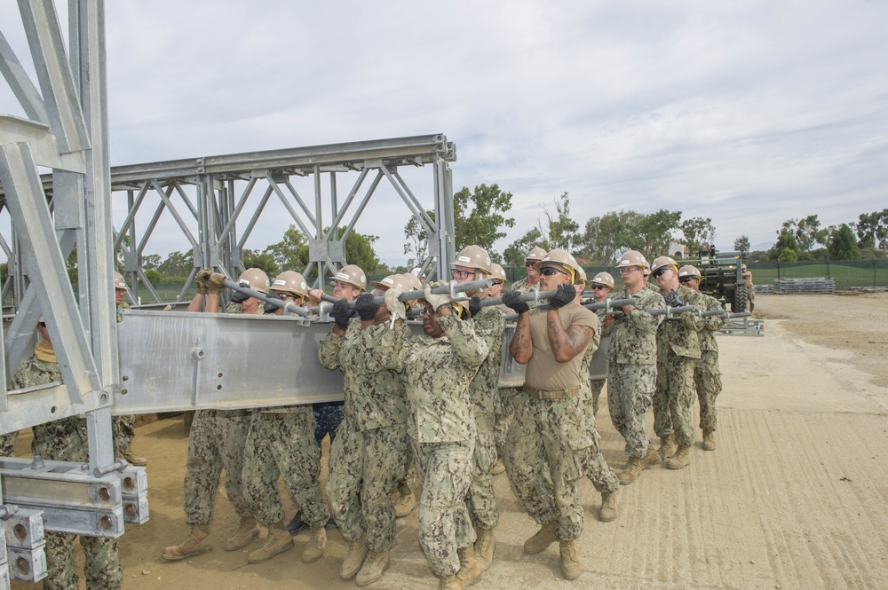 Naval Mobile Construction Battalion 4 trains to erect a Mabey Johnson Bridge