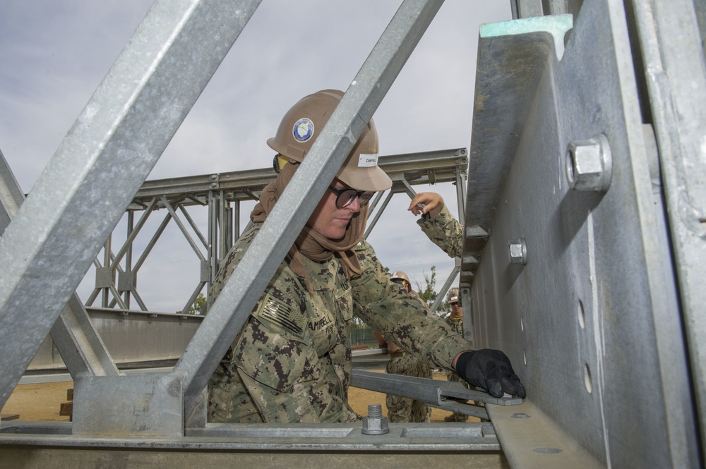 Naval Mobile Construction Battalion 4 trains to erect a Mabey Johnson Bridge