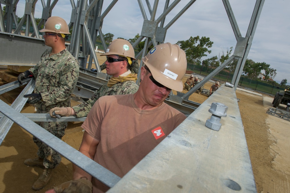 Naval Mobile Construction Battalion 4 trains to erect a Mabey Johnson Bridge