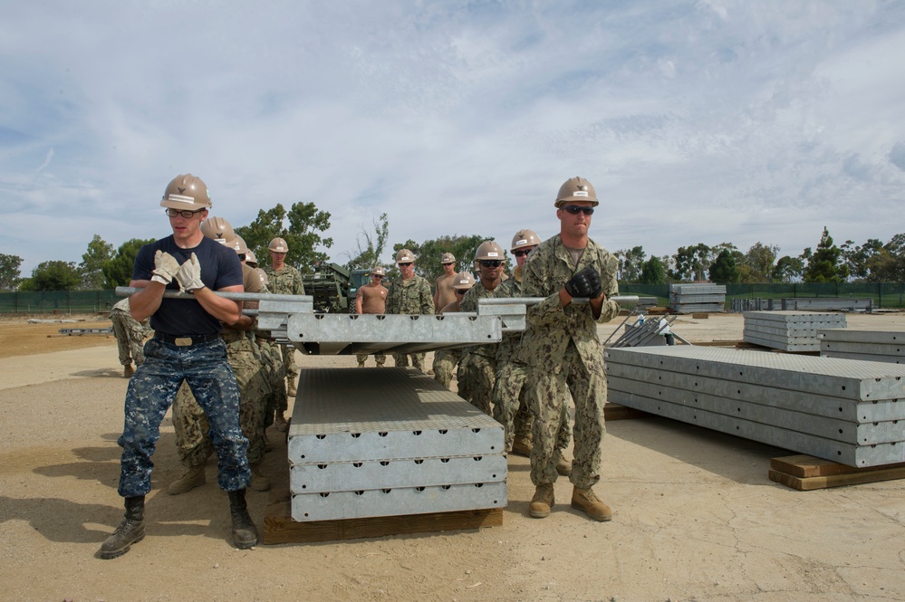 Naval Mobile Construction Battalion 4 trains to erect a Mabey Johnson Bridge