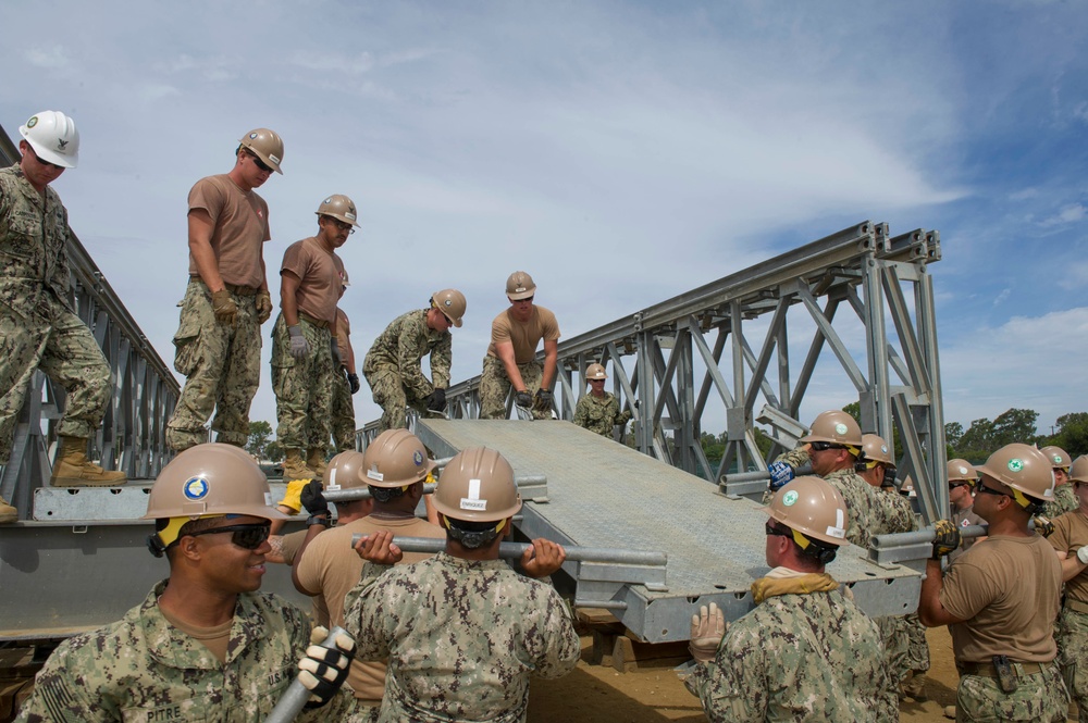 Naval Mobile Construction Battalion 4 trains to erect a Mabey Johnson Bridge