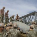 Naval Mobile Construction Battalion 4 trains to erect a Mabey Johnson Bridge