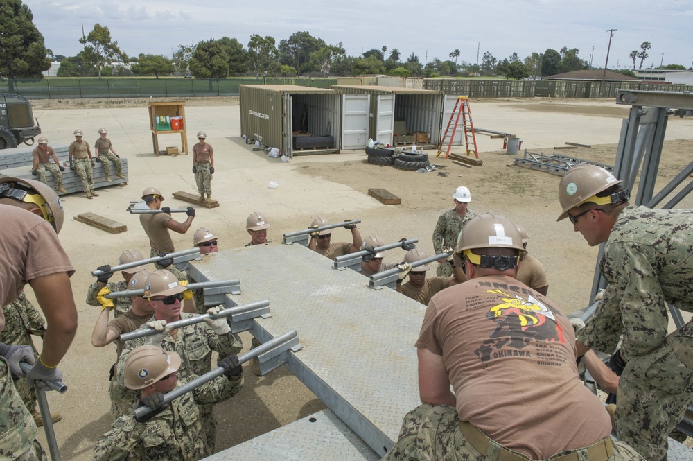 Naval Mobile Construction Battalion 4 trains to erect a Mabey Johnson Bridge