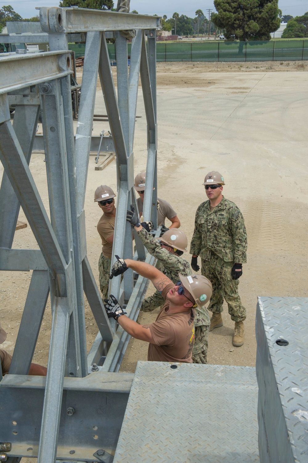 Naval Mobile Construction Battalion 4 trains to erect a Mabey Johnson Bridge