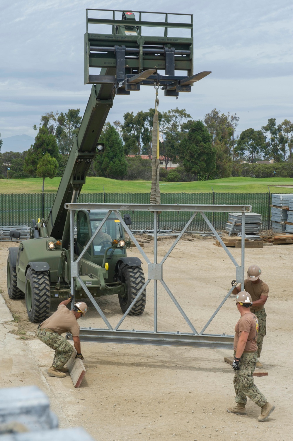 Naval Mobile Construction Battalion 4 trains to erect a Mabey Johnson Bridge