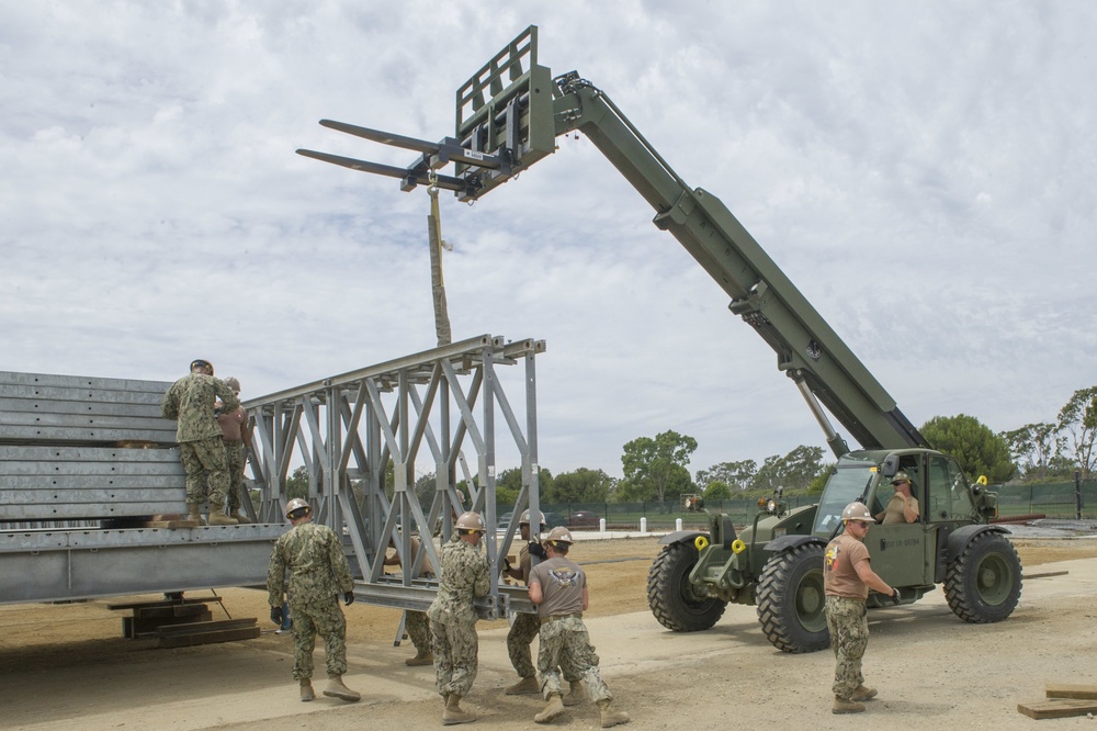 Naval Mobile Construction Battalion 4 trains to erect a Mabey Johnson Bridge