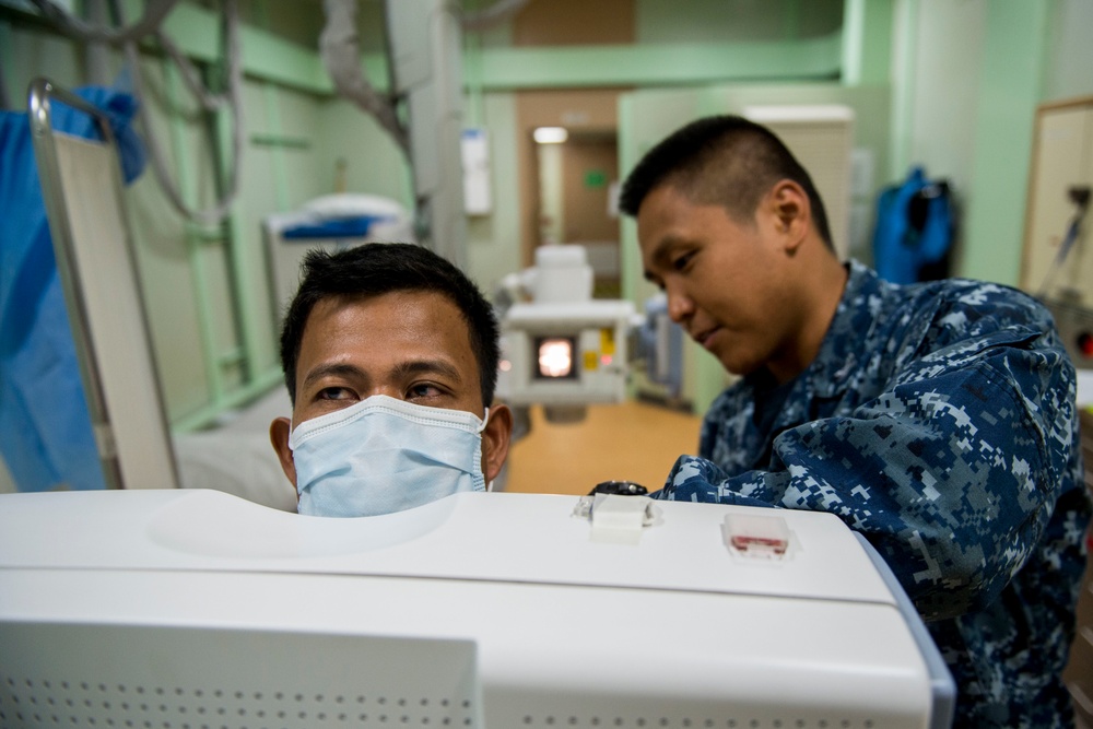 Operation Smile patients board USNS Mercy during Pacific Partnership 2015