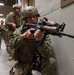 US military Combat Cameramen train in combat tactics.