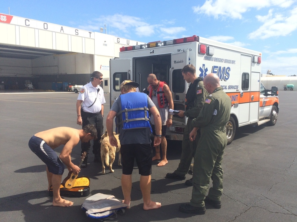 Coast Guard rescues 3 people, dog north of Oahu