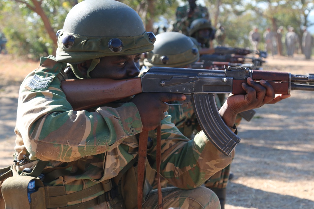 A Zambian Soldier scans his sector of fire during squad movements