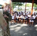 Service members read to Philippine elementary students