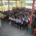 Service members read to Philippine elementary students