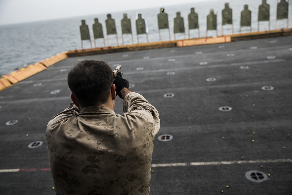 U.S. Marines practice barricade shooting at sea