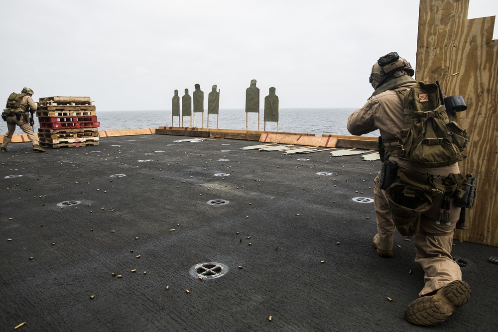 U.S. Marines practice barricade shooting at sea