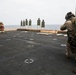 U.S. Marines practice barricade shooting at sea