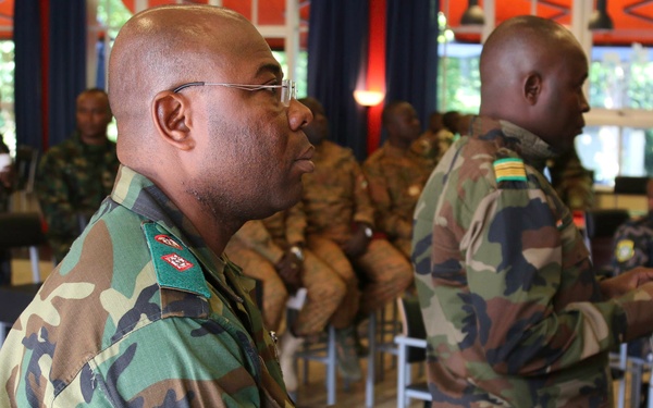 A participant of Western Accord 2015 exercise take notes during a class on information gathering