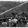 Townspeople around helicopter receiving instructions to assist in disaster relief Townspeople around helicopter receiving instructions to assist in disaster relief