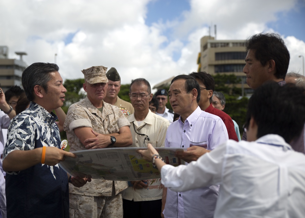 Japan Chief Cabinet Secretary visits Okinawa land return sites