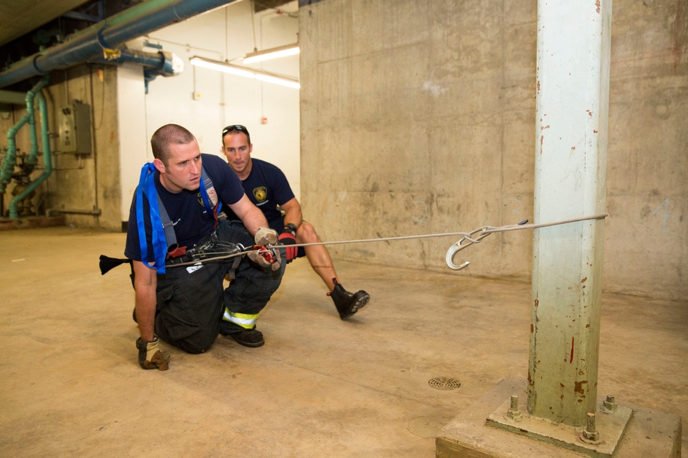 Hooks in: Local firefighters train to rappel from danger