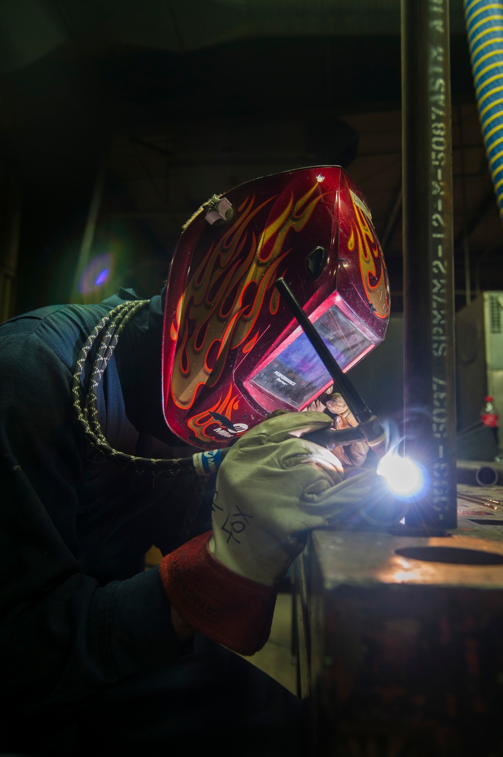 Lincoln Sailor welds metal at LIFAC