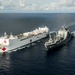 USNS Mercy and JS Mashu conduct replenishment at sea