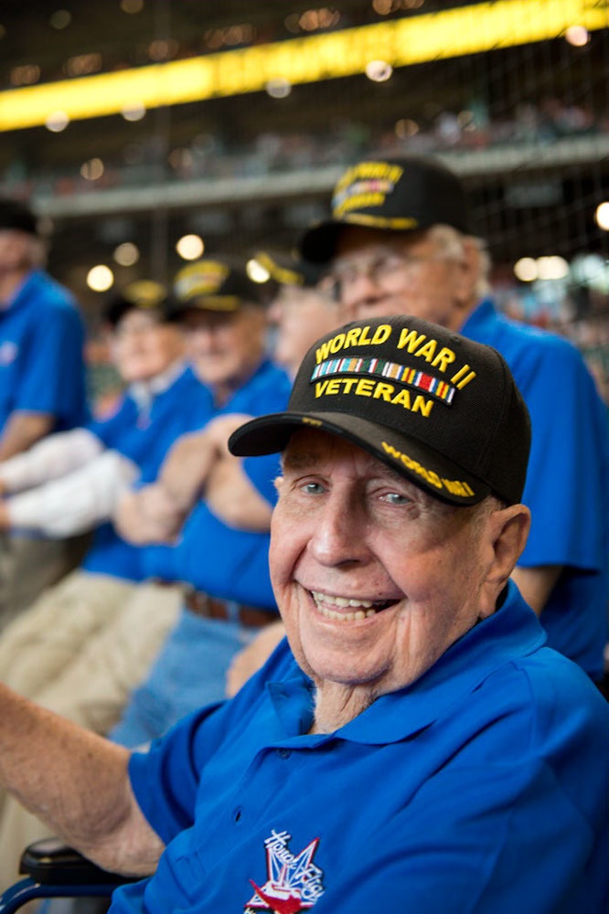 Over 40 World War II veterans at baseball game