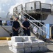 Coast Guard offloads 1,230 pounds of cocaine, transfers custody of 2 drug smugglers in San Juan, Puerto Rico