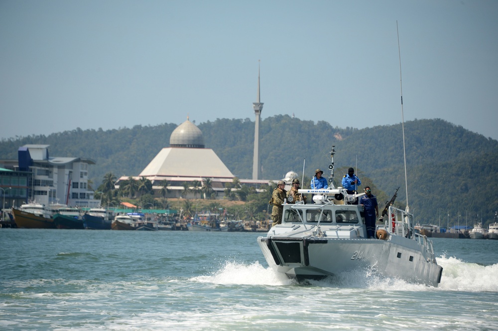 CRS-4 conducts boat formation training with Royal Malaysian Navy