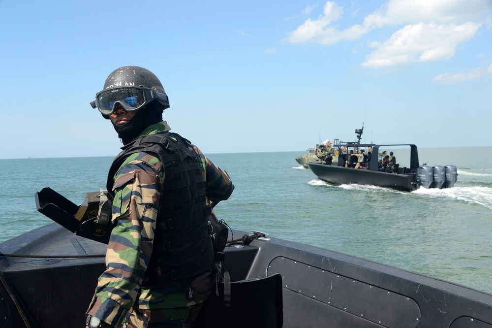 CRS-4 conducts boat formation training with Royal Malaysian Navy