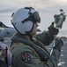 MH-60R pilot checks fuel before refueling on USS Germantown (LSD 42)