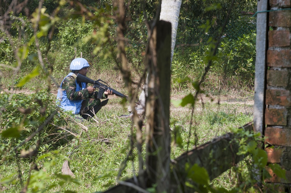 Bangladesh army soldiers conduct dismounted patrol during Keris Aman 2015