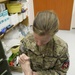 US Navy personnel at Role 3 MMU provide patient care, Kandahar Airfield