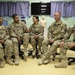 Navy Chief Petty Officer selectees at Role 3 MMU discuss CPO 365, Kandahar Airfield