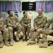 Navy Chief Petty Officer selectees at Role 3 MMU discuss CPO 365, Kandahar Airfield